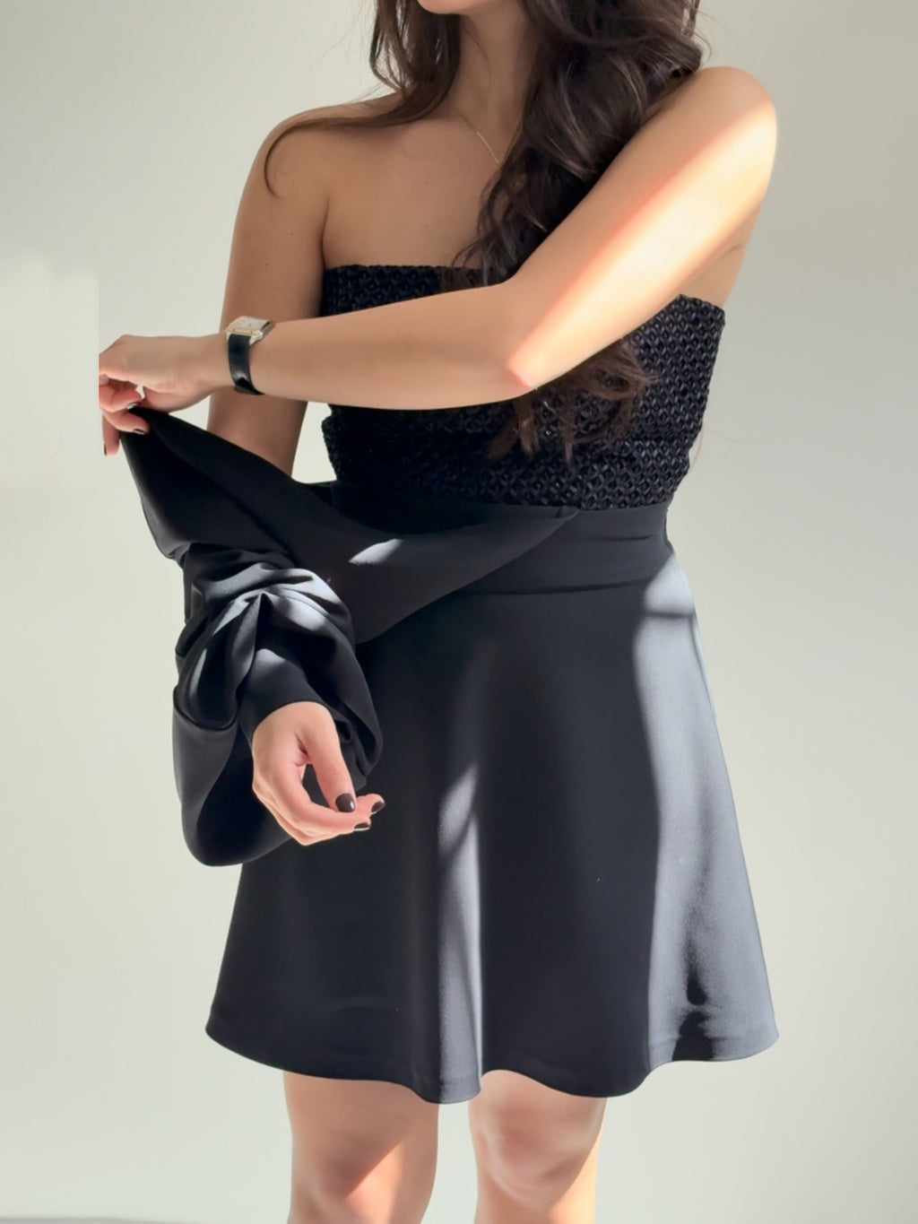 Black Two-Piece Set With Textured Strapless Top And Flared Mini Skirt